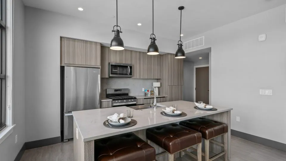 Open one bedroom apartment at Salt Lake Crossing with modern kitchen.