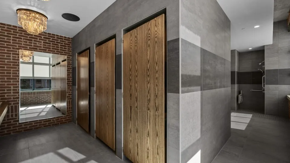 Salt Lake Crossing locker room with showers.