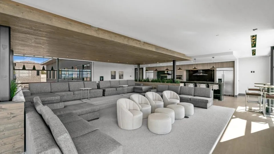 Salt Lake Crossing family room with plush seating and community kitchens.