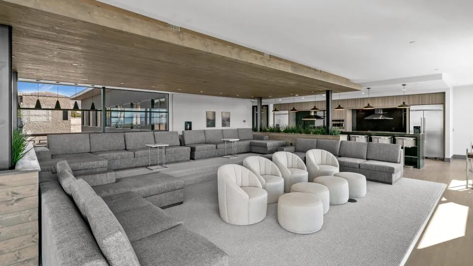 Salt Lake Crossing family room with plush seating and community kitchens.