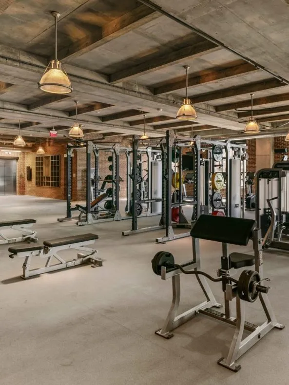 Fitness Center at Salt Lake Crossing with weight machines and squat racks.