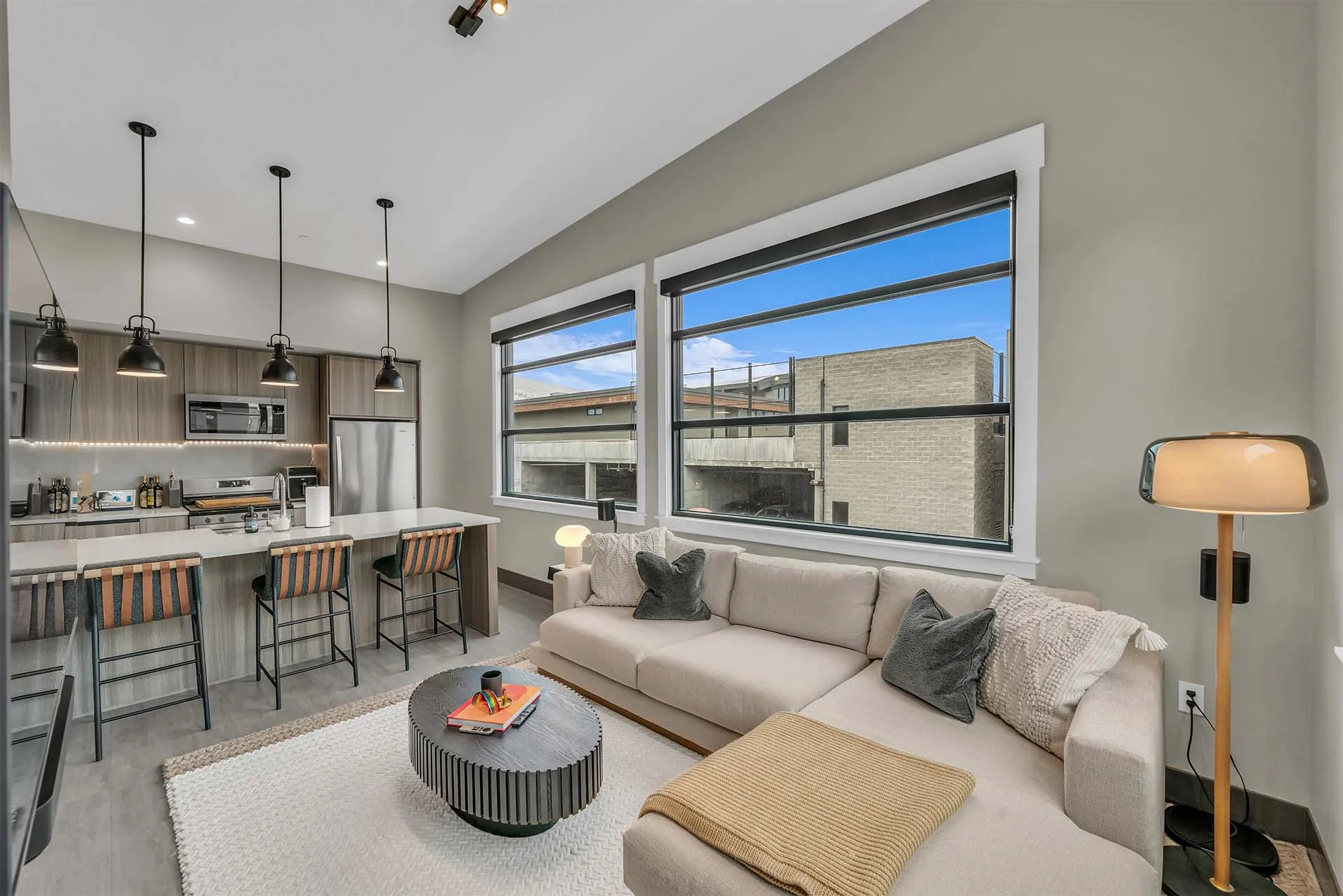 Apartment living area and kitchen at Salt Lake Crossing.