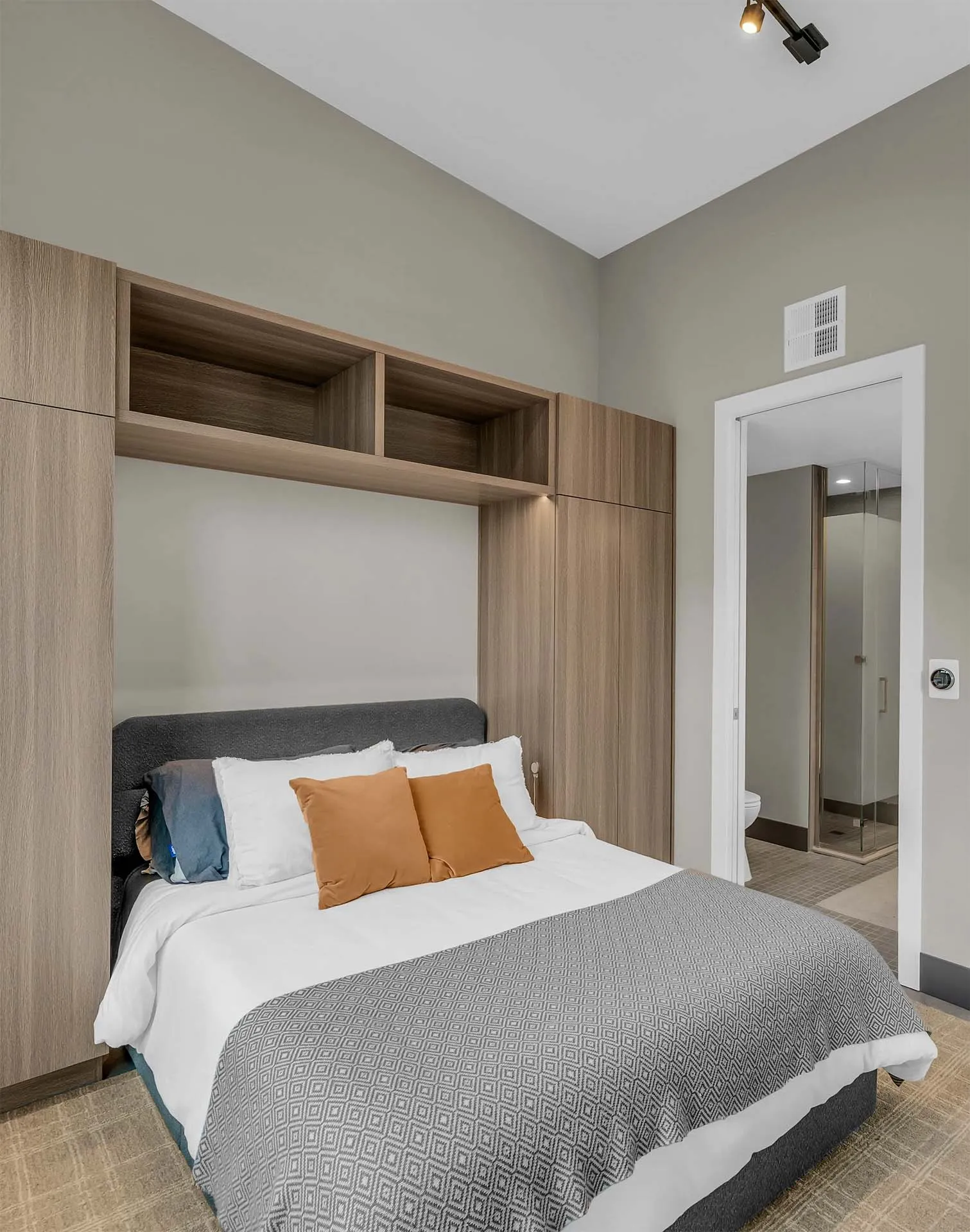 Bed in open one bedroom apartment at Salt Lake Crossing.
